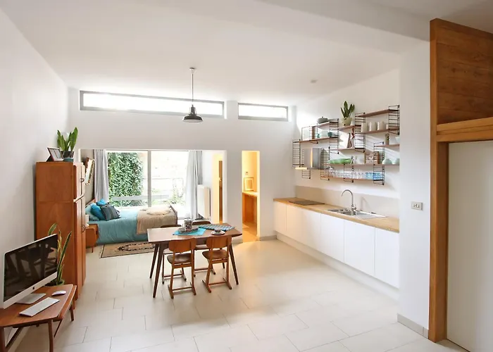 Lounge In The Intimate Urban Garden At A Retro Getaway