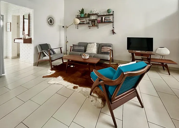 Lounge In The Intimate Urban Garden At A Retro Getaway