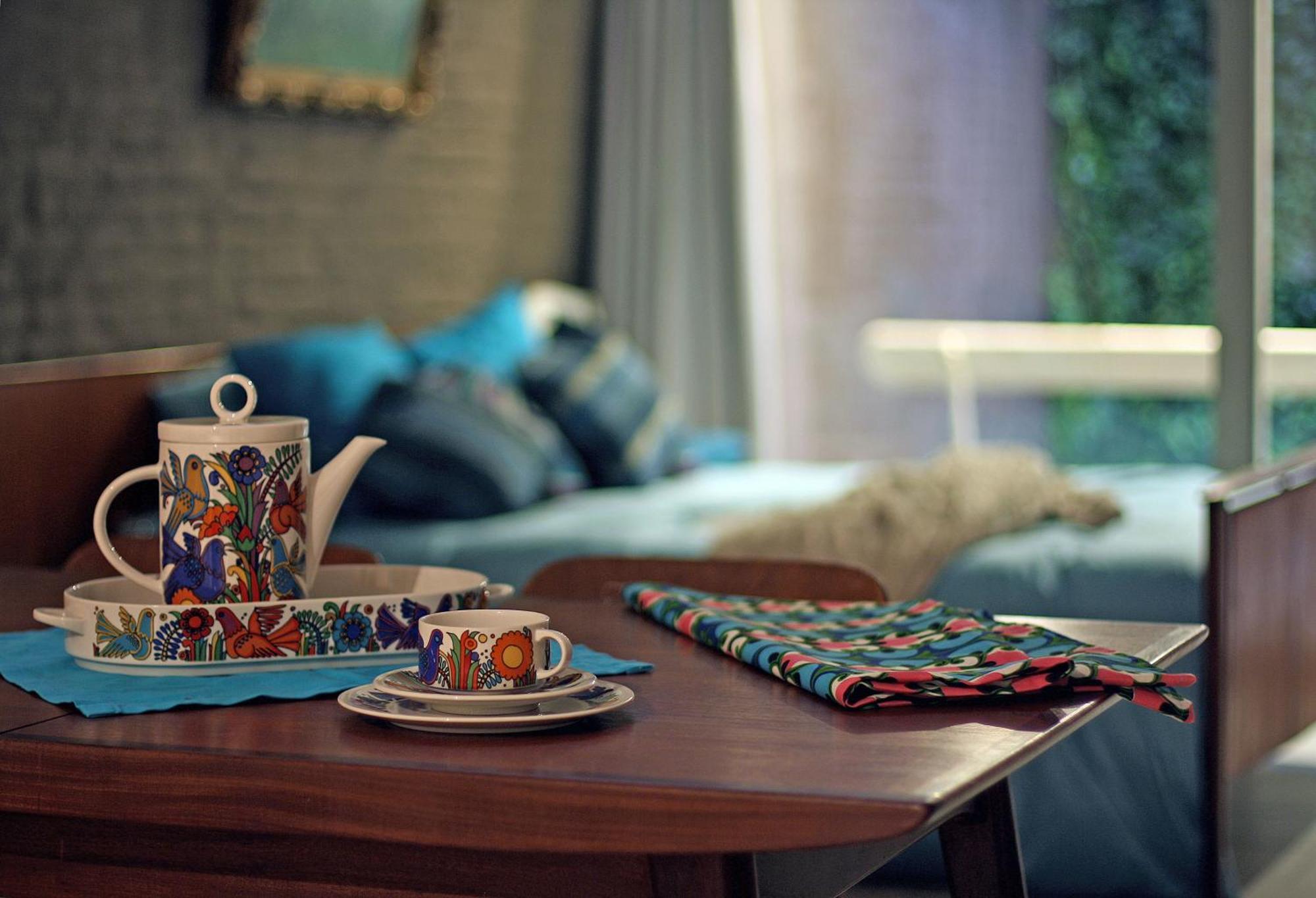 Lounge In The Intimate Urban Garden At A Retro Getaway
